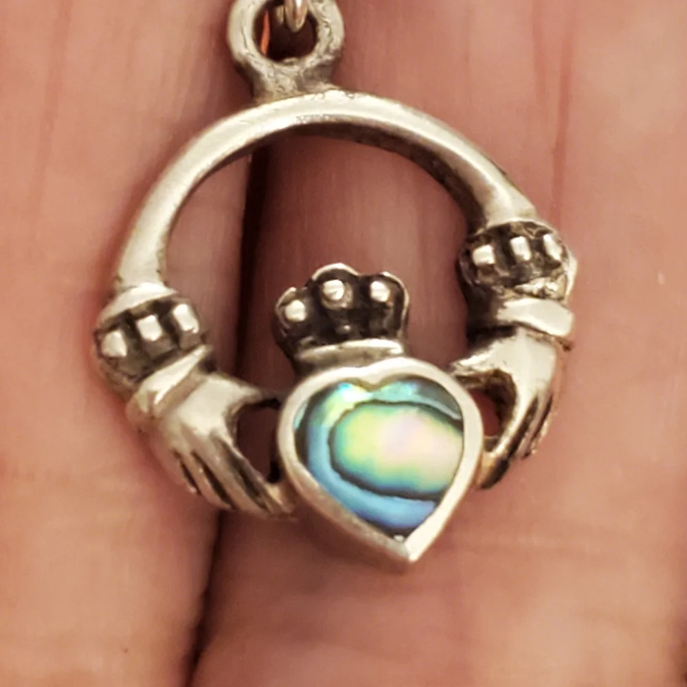 Sterling silver claddagh abalone earrings